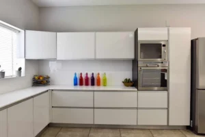 interior-designers-in-idukki-white-high-gloss-kitchen